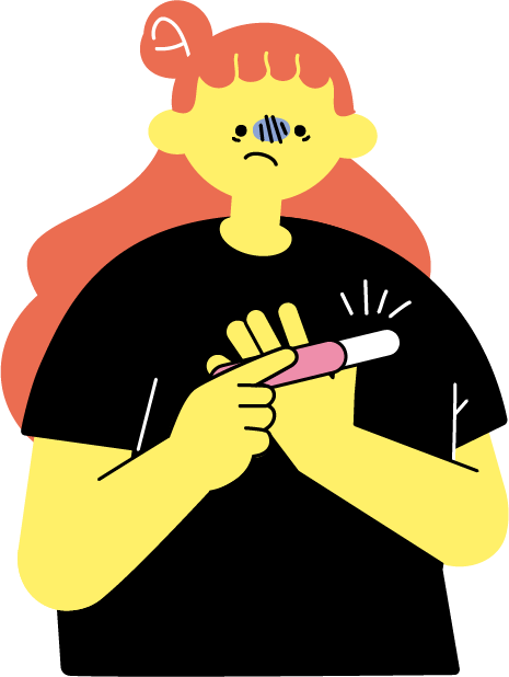 妊娠検査薬を見て戸惑う女性