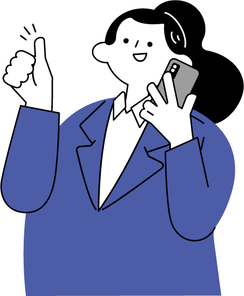 電話中にOKサインを出す女性（スーツ）
