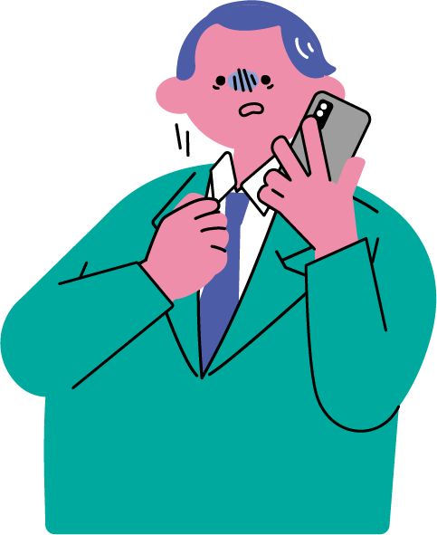 電話で上司に怒られて萎縮する男性