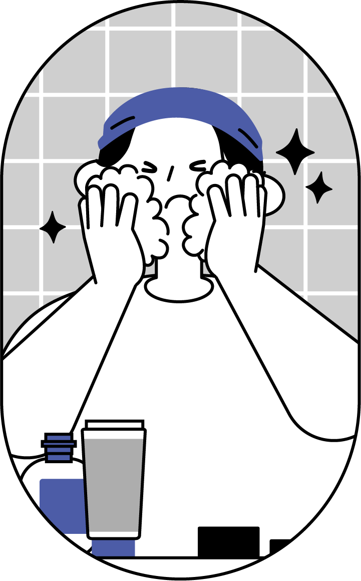 泡立てて洗顔する男性
