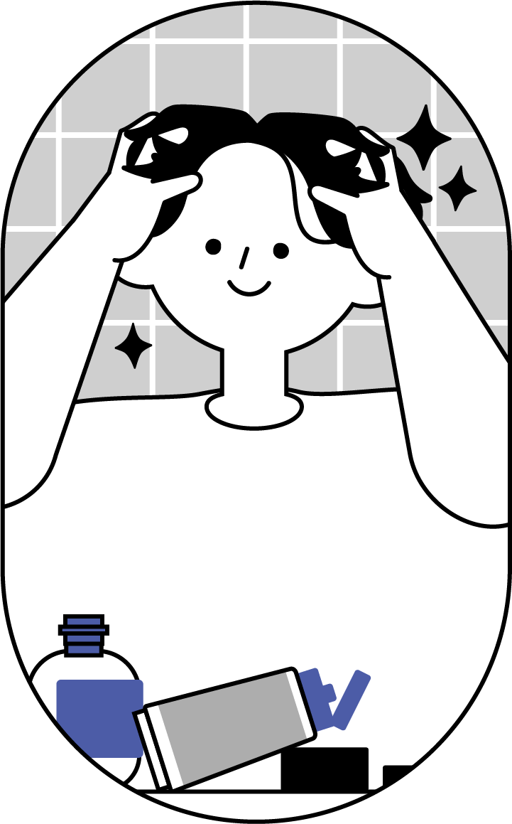 ワックスで髪をセットする男性